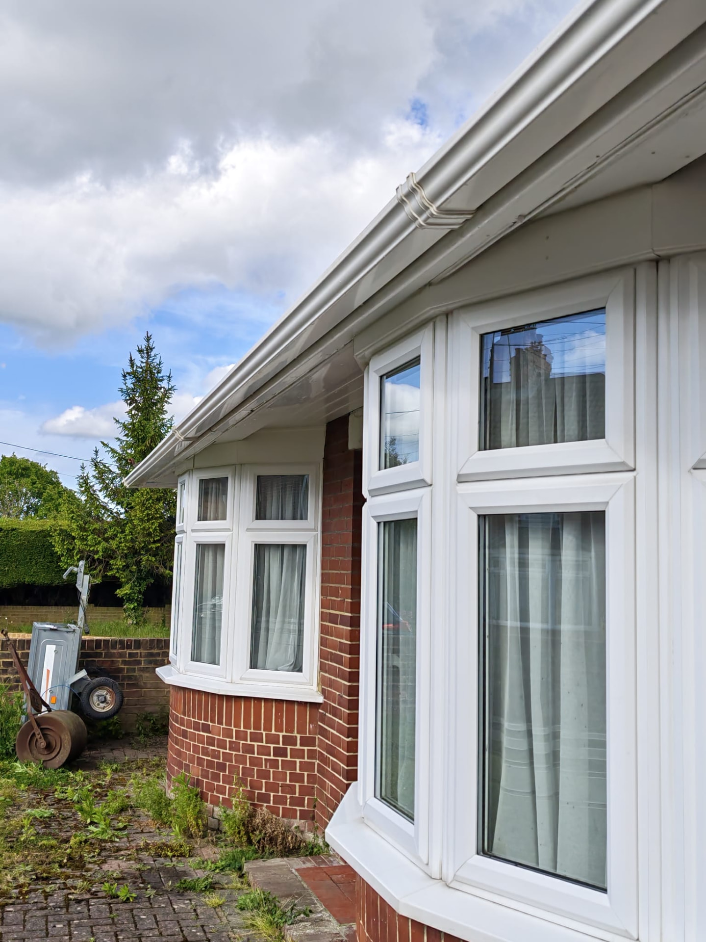 Restored front gutter and fascia after cleaning by OOR External